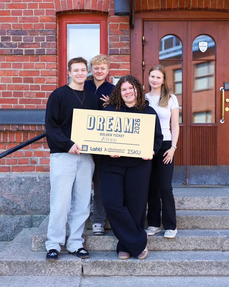 Alex, Kalle, Pihla and Iida holding the Dream 2026 Golden Ticket